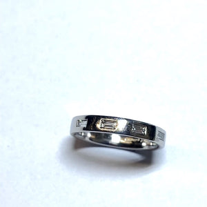 Platinum and Baguette Diamond Ring